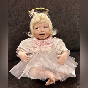 Ashton Drake porcelain precious pink angel doll.